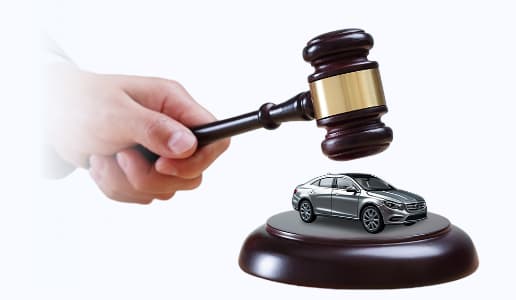 Auction gavel and car