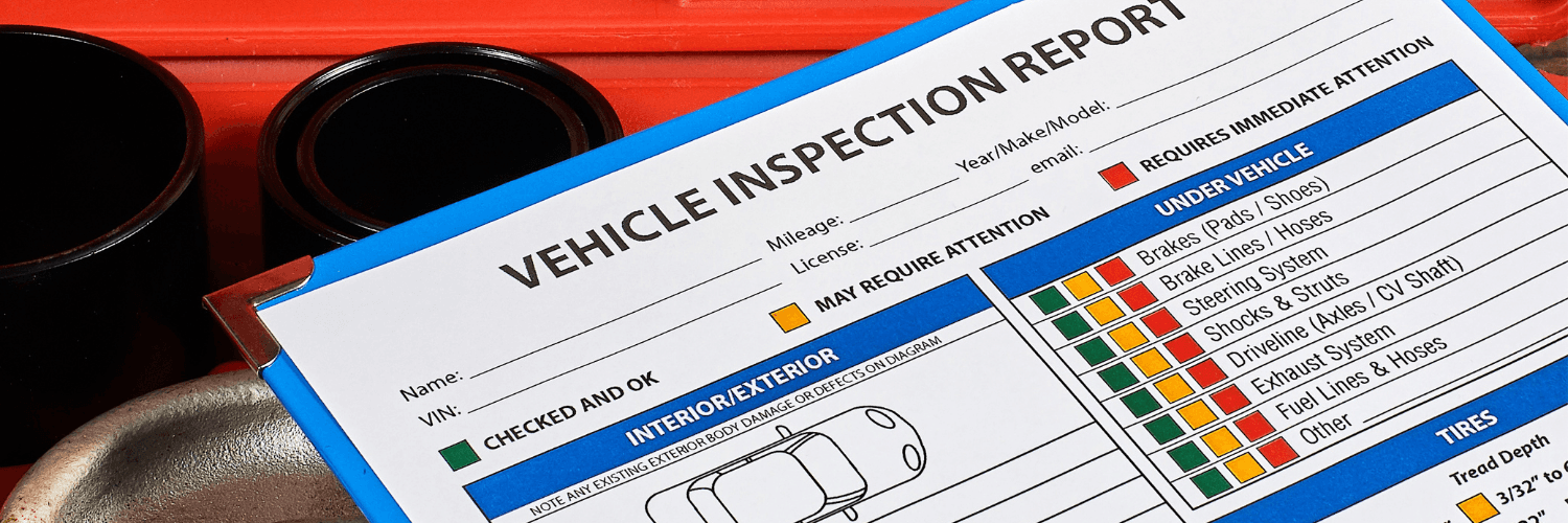 Vehicle inspection report worksheet on a service desk